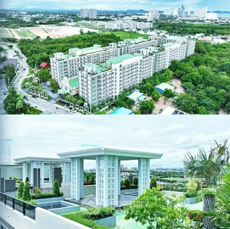 Aerial view of modern residential complex with lush greenery and rooftop garden.