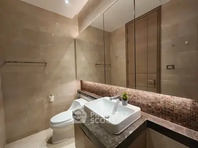 Luxurious modern bathroom with elegant fixtures and ambient lighting