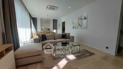 Spacious modern living room with elegant decor and natural light