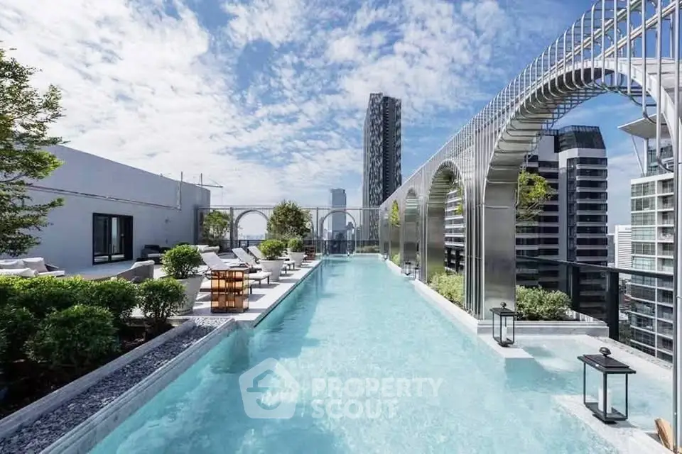 Luxurious rooftop pool with stunning cityscape views and modern architectural design.