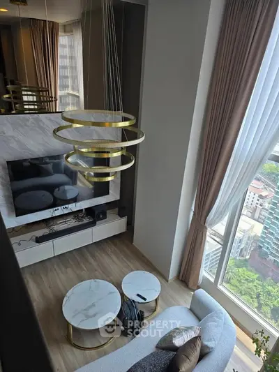 Luxurious high-rise living room with modern decor and stunning city view.