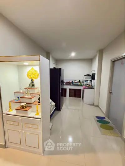 Modern kitchen with sleek cabinets and appliances in a spacious open layout