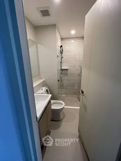 Modern bathroom with sleek design and glass shower enclosure