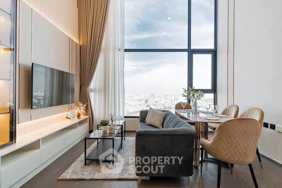 Luxurious living room with floor-to-ceiling windows and stunning city view
