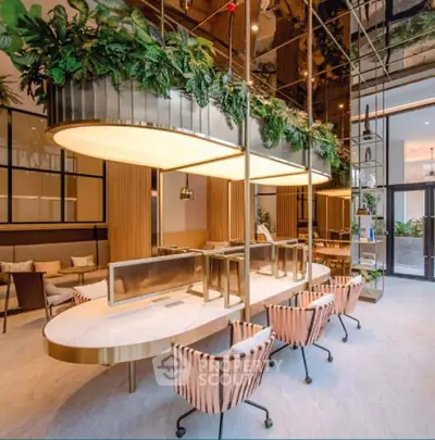 Luxurious modern interior with elegant lighting and stylish seating in a sophisticated setting.