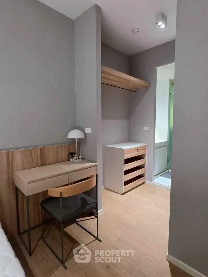 Modern study area with sleek desk and chair in minimalist apartment