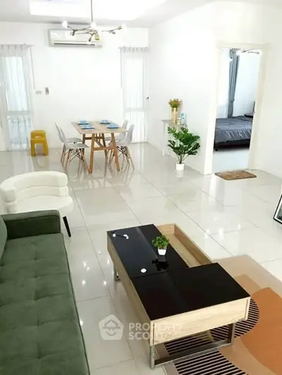 Spacious modern living room with dining area and stylish furniture