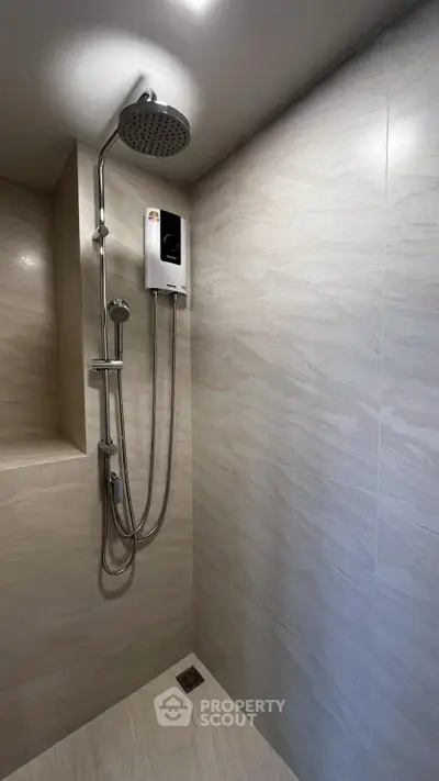 Modern bathroom with sleek shower and elegant tile design