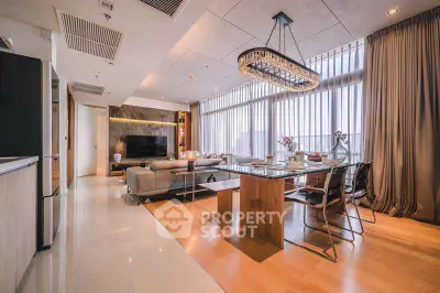 Luxurious modern living room with elegant dining area and panoramic city views.