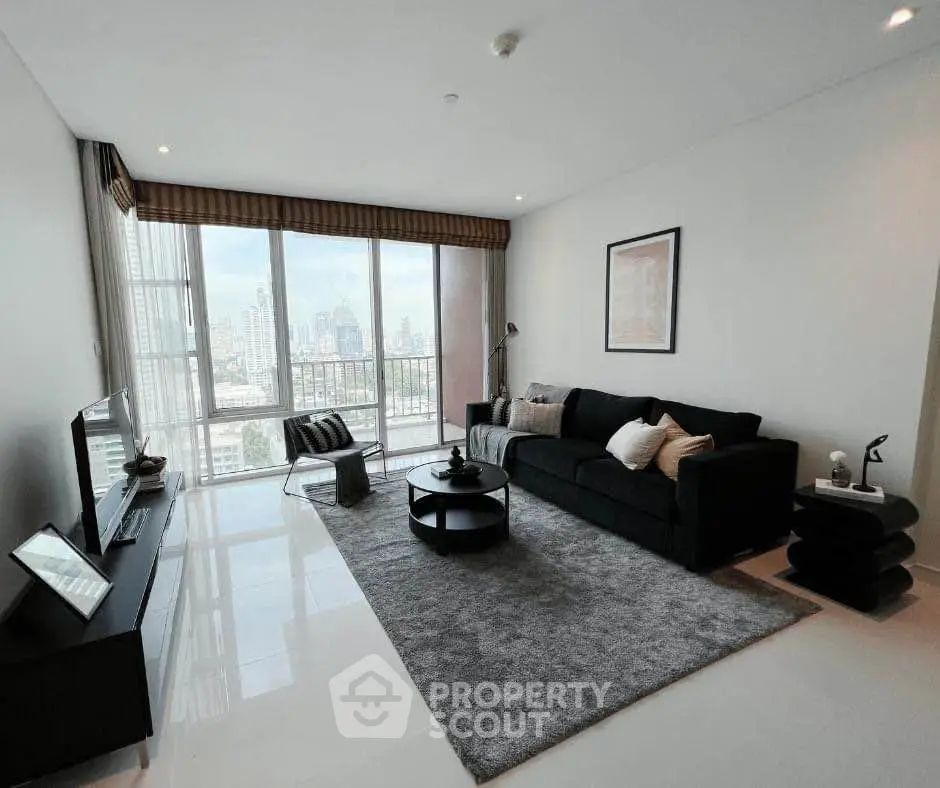Spacious modern living room with city view and stylish decor