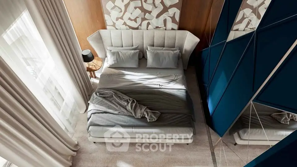 Luxurious modern bedroom with stylish decor and ample natural light