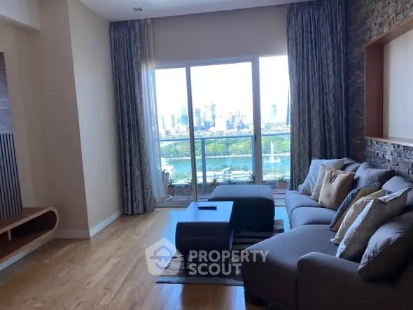 Spacious living room with stunning city view and elegant decor