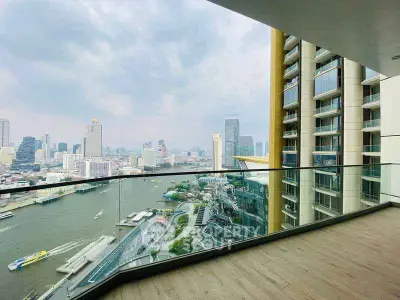 Stunning city and river view from a spacious balcony in a modern high-rise apartment.