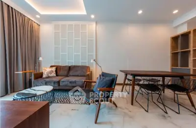 Modern living room with stylish furniture and elegant lighting