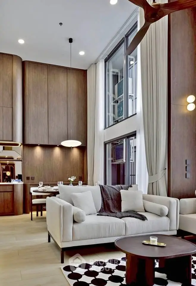 Luxurious modern living room with high ceilings and elegant decor