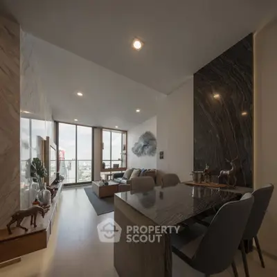 Luxurious modern living room with elegant decor and stunning city view.