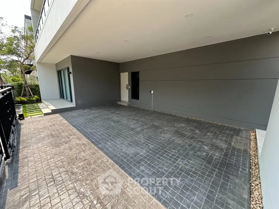 Spacious modern parking area with sleek design and ample space in a contemporary building.