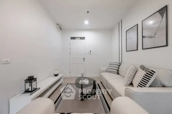 Modern minimalist living room with sleek furniture and stylish decor