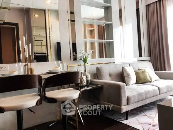 Modern living room with elegant decor and stylish furniture in a cozy apartment setting.