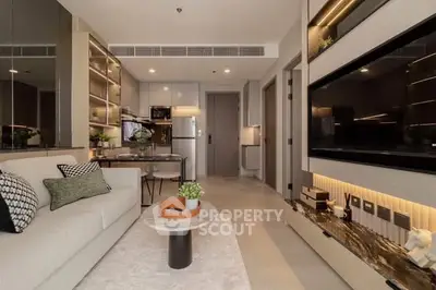 Modern living room with open kitchen and stylish decor