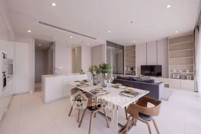 Luxurious open-plan living and dining area with modern furnishings and elegant decor.