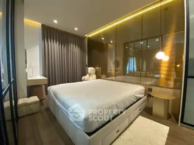 Luxurious bedroom with modern decor and plush bedding in a stylish apartment.