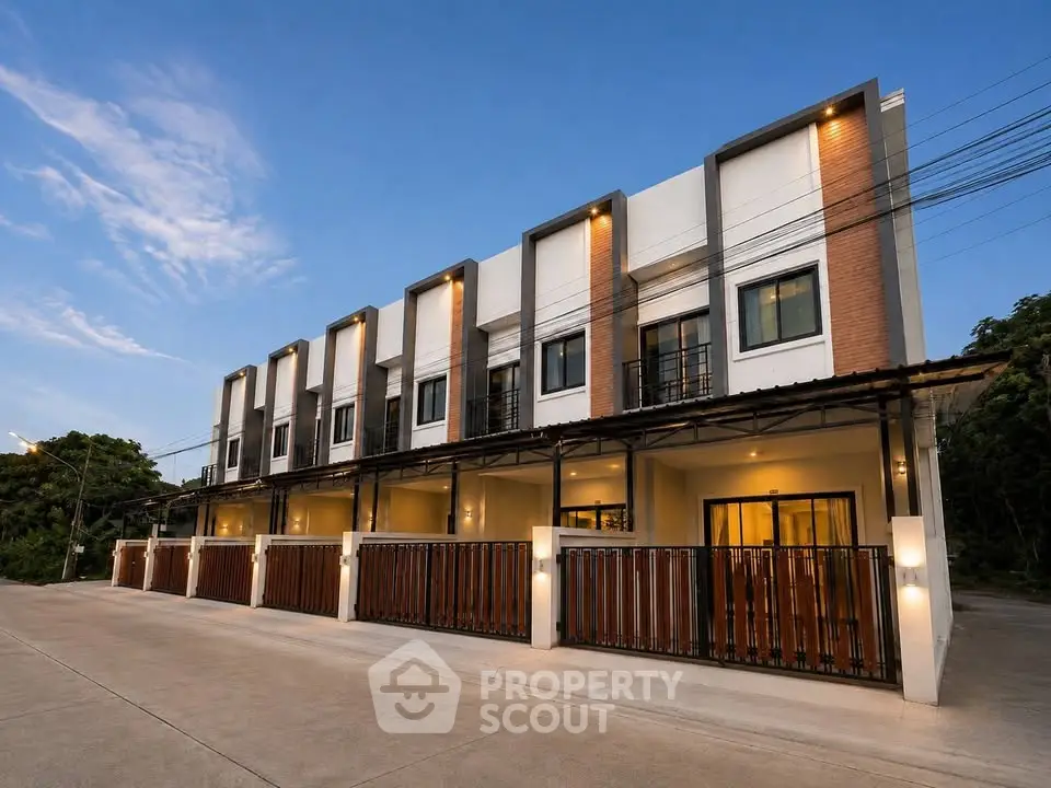 Modern townhouse exterior with sleek design and ample parking space