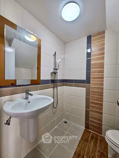 Modern bathroom with sleek fixtures and stylish tile design