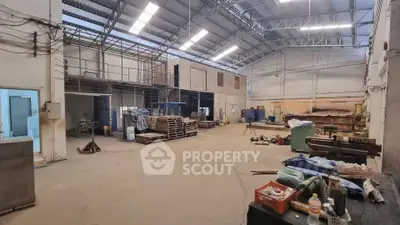 Spacious industrial warehouse with high ceilings and ample storage space