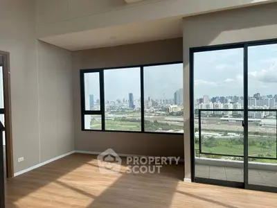 Spacious corner unit with stunning cityscape view and large windows.