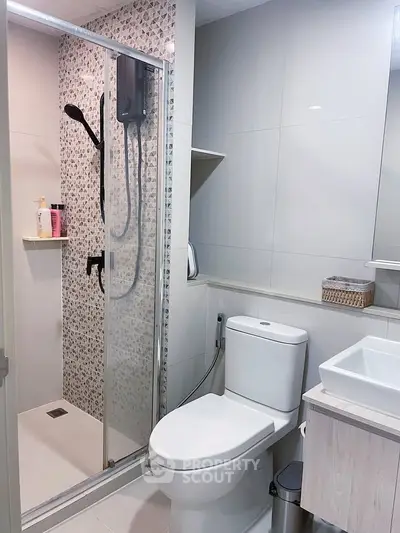 Modern bathroom with sleek shower and contemporary fixtures