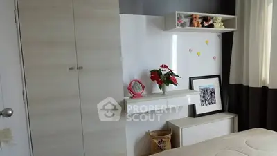 Charming bedroom with modern decor and ample storage space