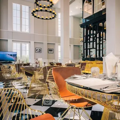 Luxurious dining area with elegant decor and high ceilings, perfect for upscale living.