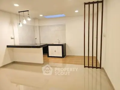Modern minimalist kitchen with open layout and sleek design
