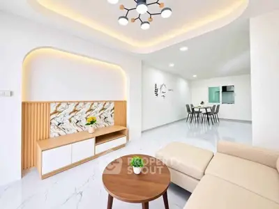 Modern living room with elegant lighting and stylish furniture