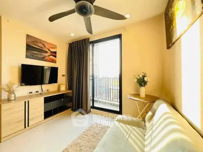 Bright and cozy living room with modern decor and balcony access