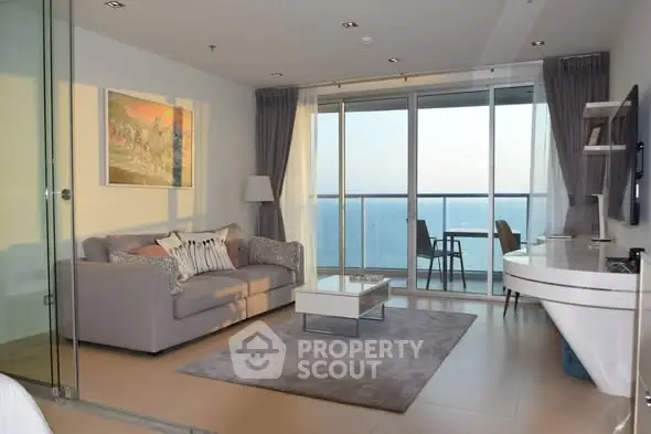 Luxurious living room with stunning ocean view and modern decor