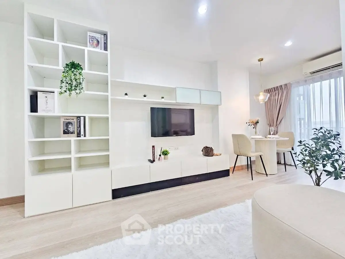 Modern living room with stylish shelving and cozy dining area
