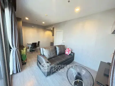 Modern living room with sleek furniture and natural light