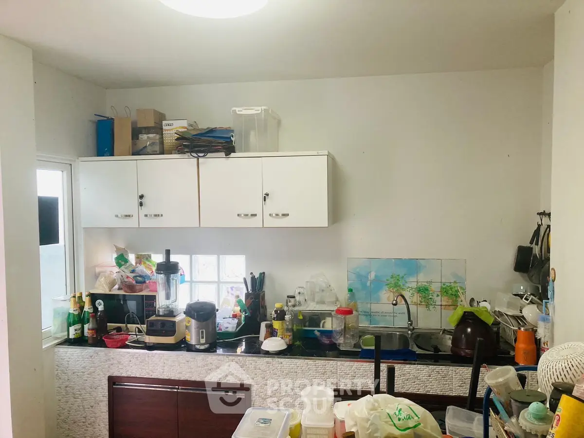 Cozy kitchen with modern appliances and ample storage space