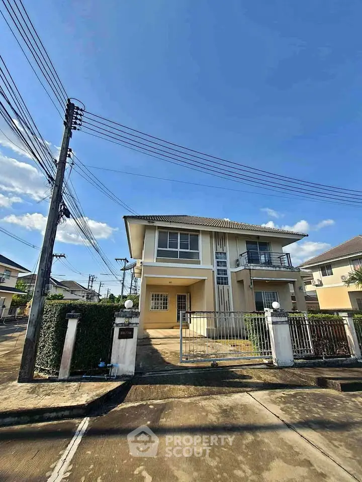Charming two-story house with spacious driveway and modern design in a serene neighborhood.
