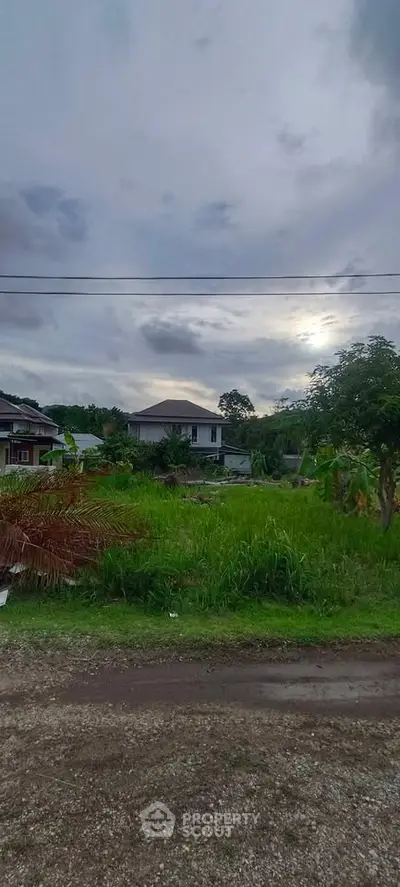Charming countryside property with lush greenery and serene surroundings, perfect for tranquil living.