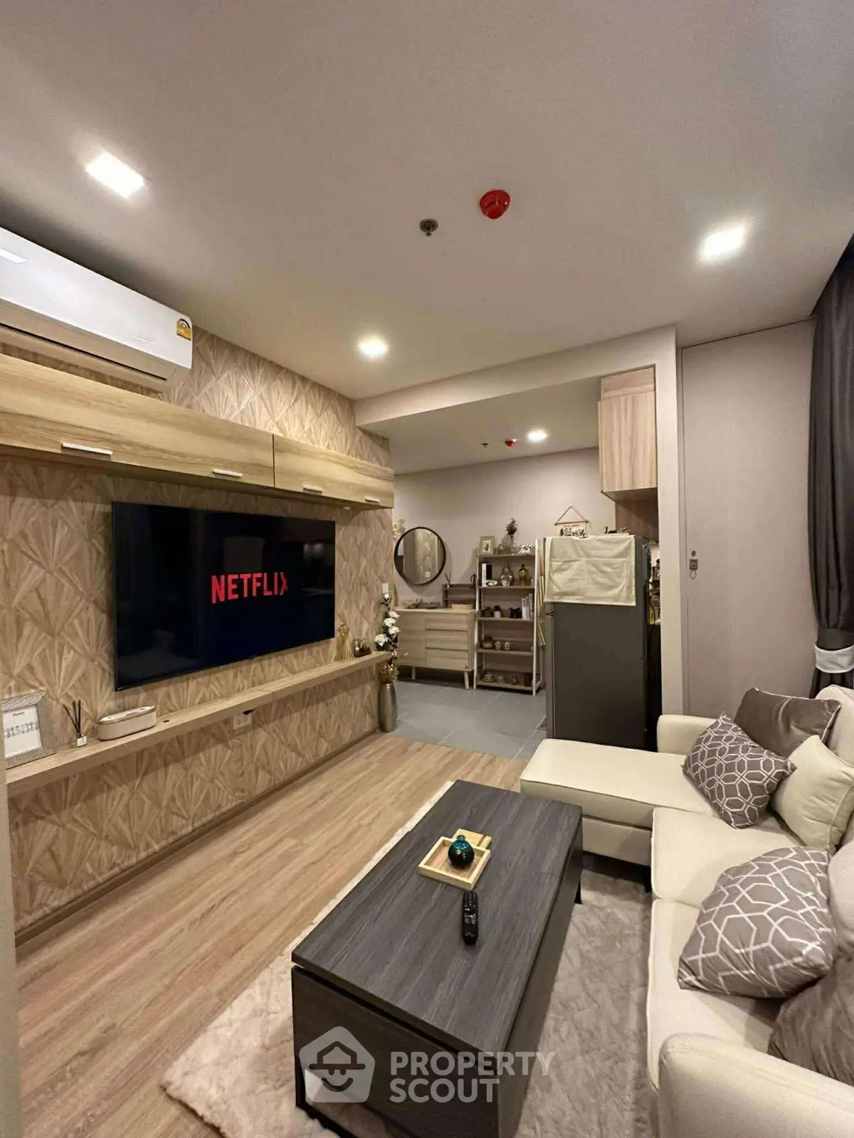 Modern living room with stylish decor and entertainment setup