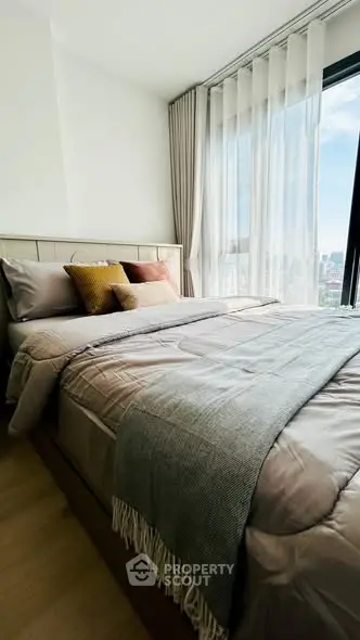 Modern bedroom with city view and stylish decor