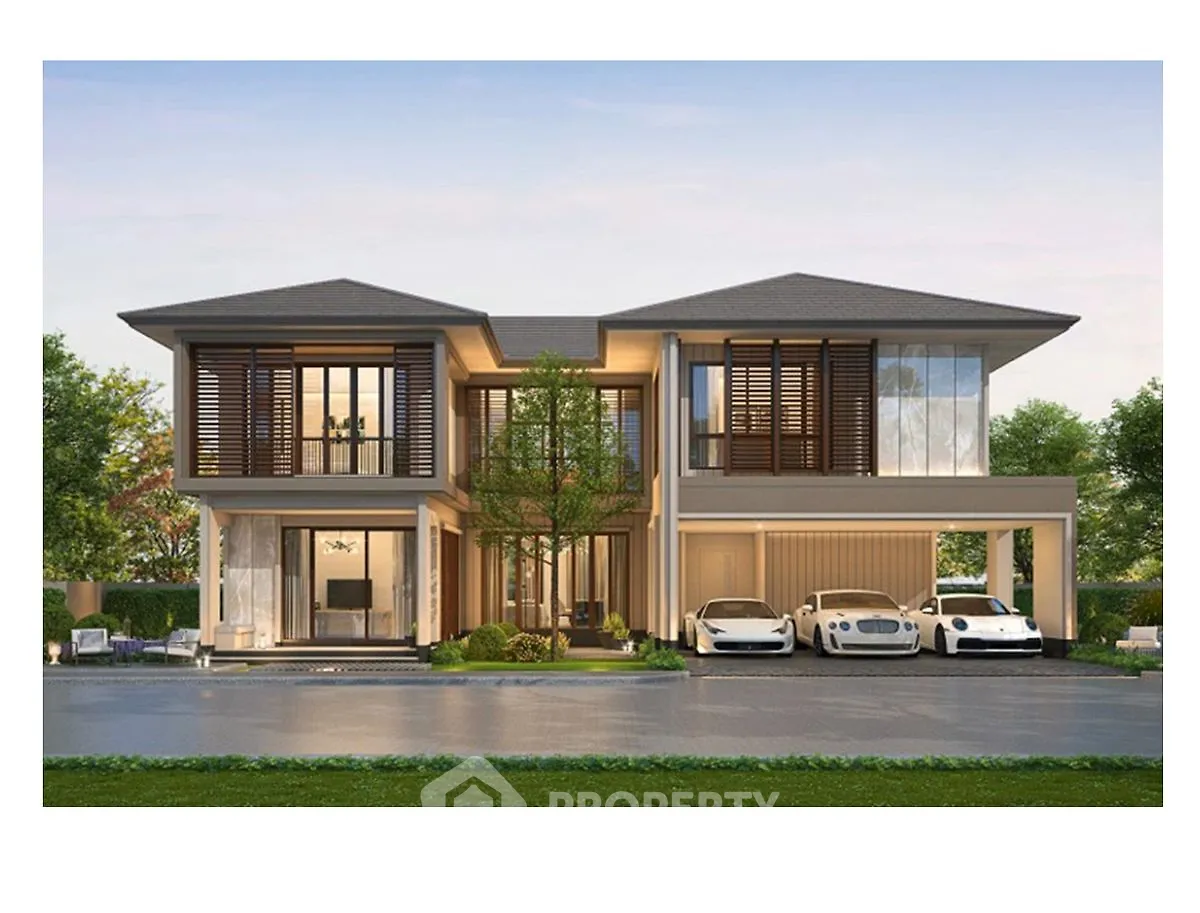 Luxurious modern two-story house with sleek design and spacious driveway.