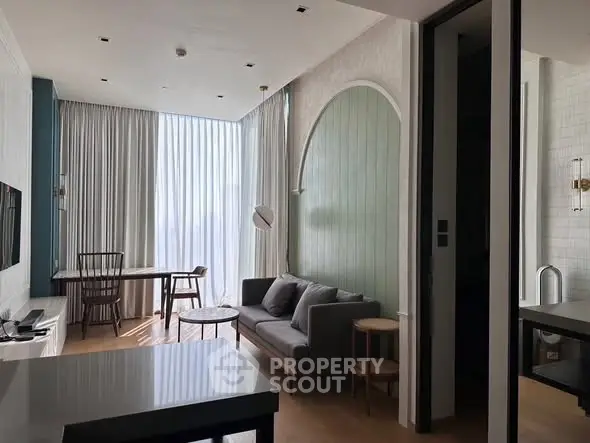 Modern living room with stylish furniture and natural light