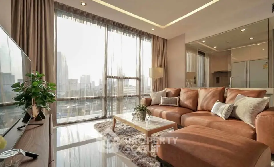 Luxurious living room with large windows and city view, featuring elegant brown leather sofa and modern decor.