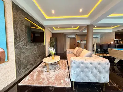 Luxurious modern living room with elegant decor and ambient lighting