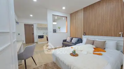 Modern bedroom with cozy decor and open layout