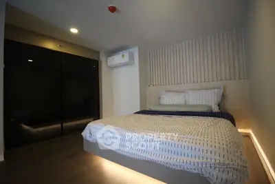 Modern bedroom with ambient lighting and sleek design